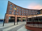 Outside Piano Building at night