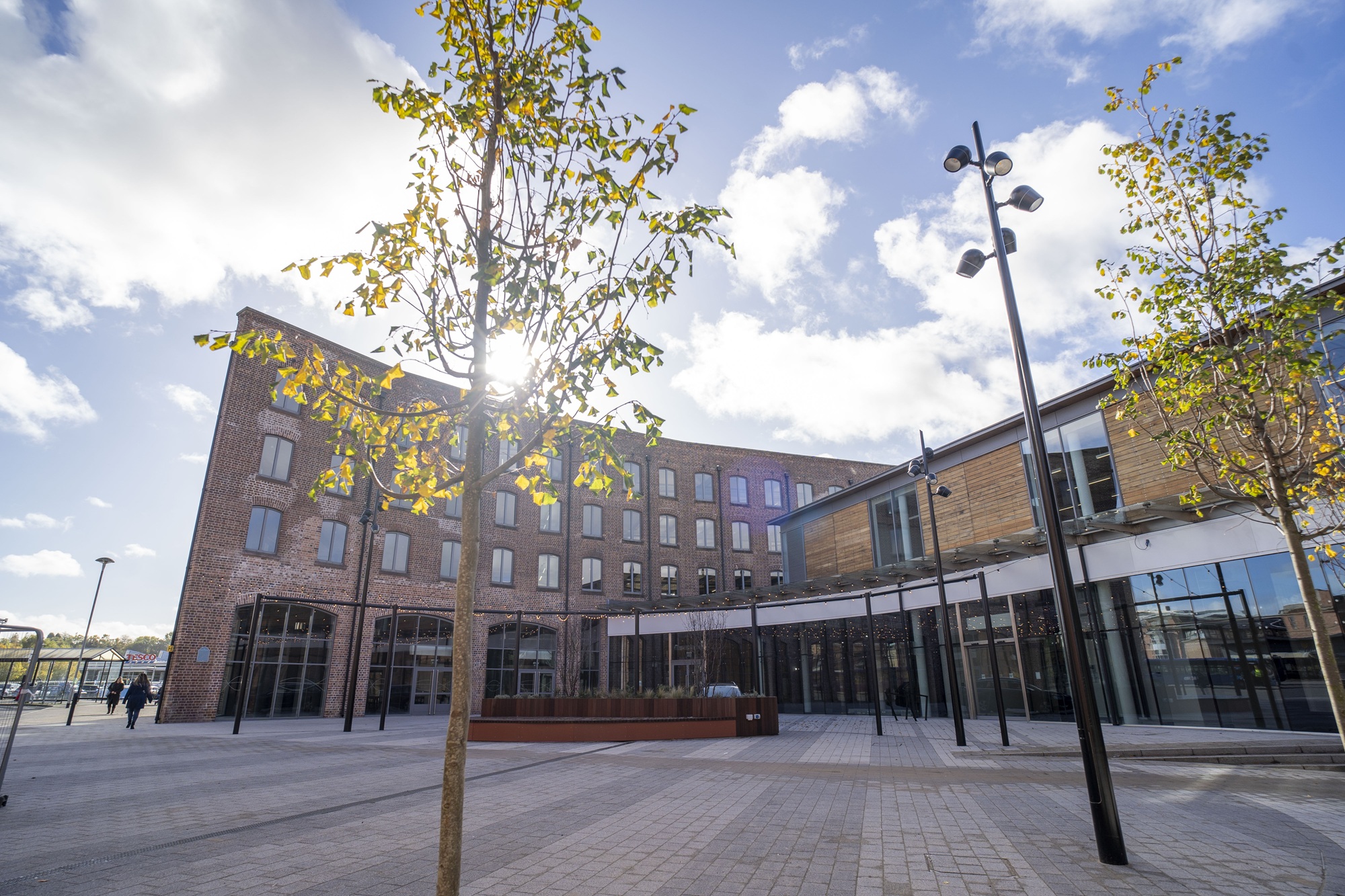 The Piano Building in background with trees in foreground
